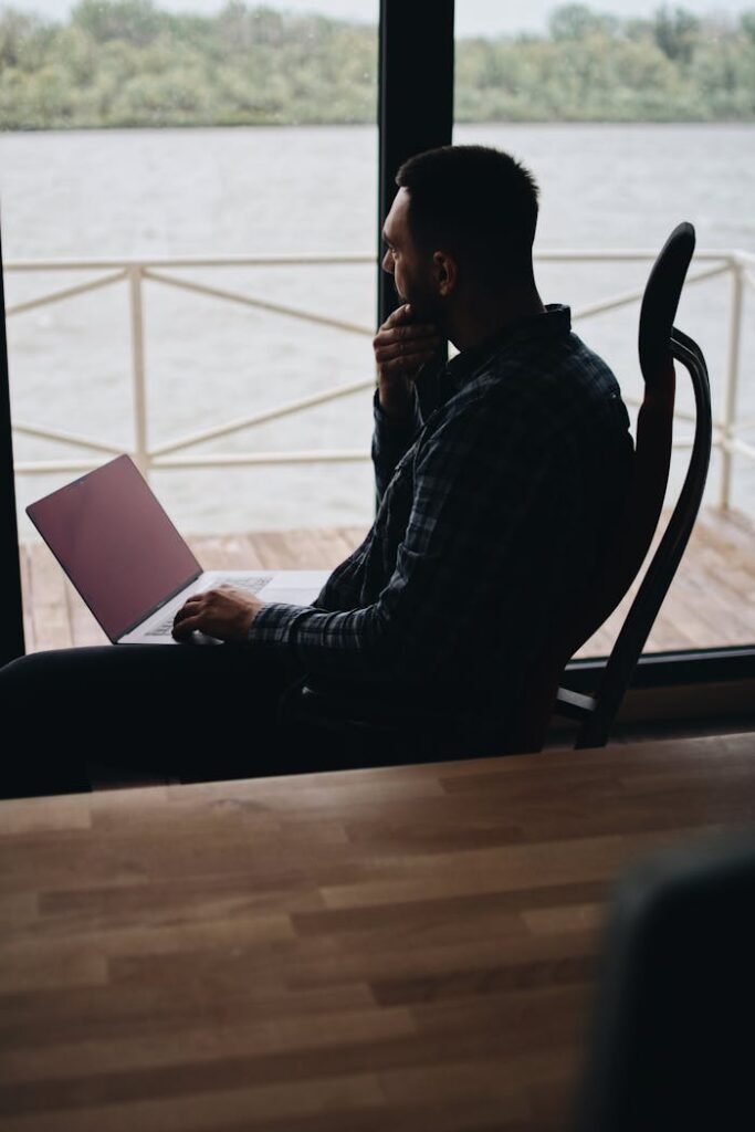 Man Sitting on Chair